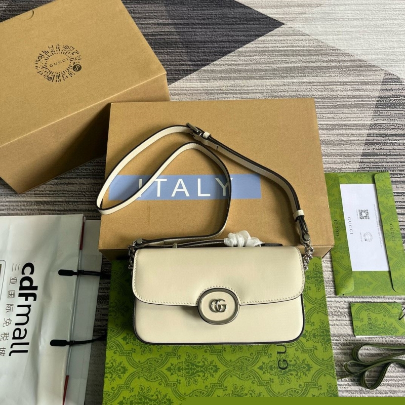 G*u*i satchel bags